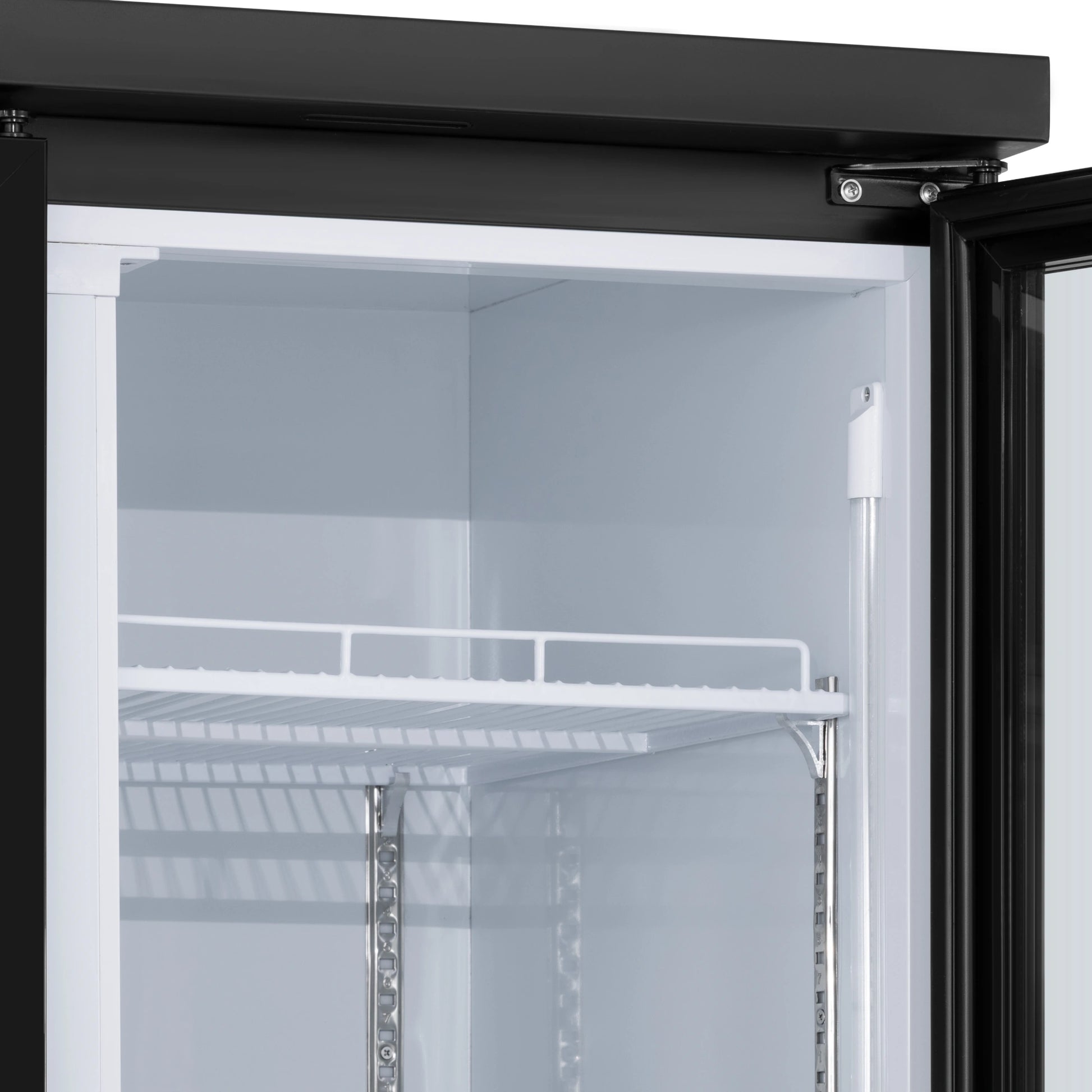 Close-up of the lower glass door frame, shelving edge, and caster wheel assembly