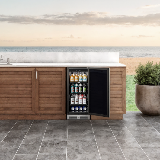 Small beverage cooler installed inside a cabinet, showing a clean and integrated built-in look